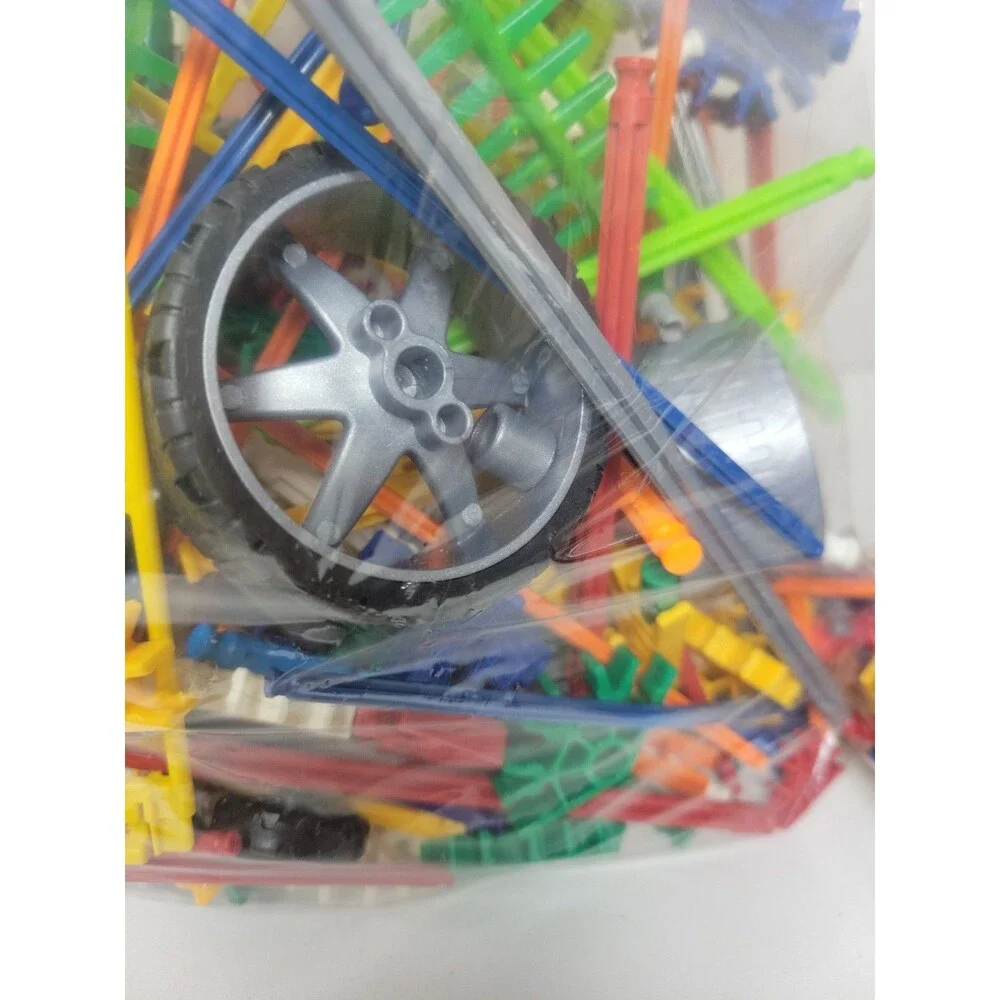 K'nex Building Pieces and Parts Wheels Corners Rods Spokes 8 lb bulk lot BOOKS